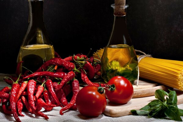 Set di buongustai. Pomodori, peperoncini e olio d oliva