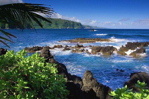 Mighty mountains hanging over the ocean