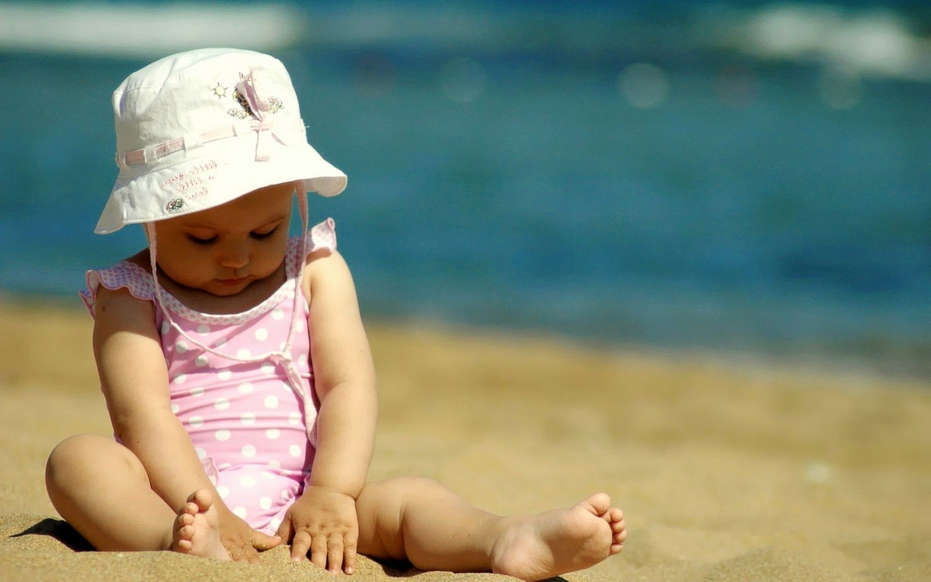 children at a lesson child beach outdoors water baby summer girl leisure sand travel fun seashore little daylight toddler sea recreation enjoyment vacation