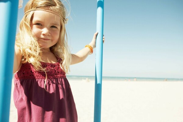 A young princess. Sun, wind, sea, beach.