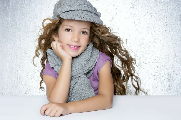 Portrait of a little girl with a hairstyle