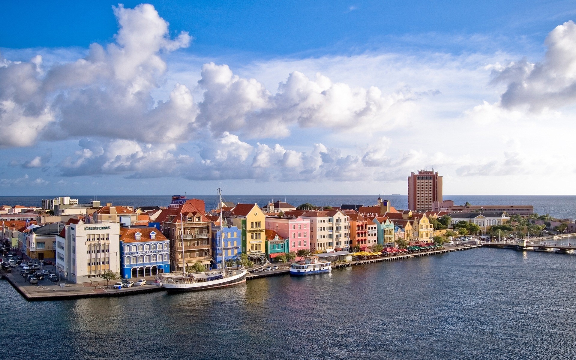 other city water architecture travel city sky outdoors building cityscape harbor town river waterfront sea urban caribbean port houses