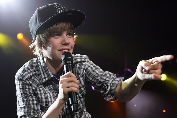 Justin bieber with a microphone