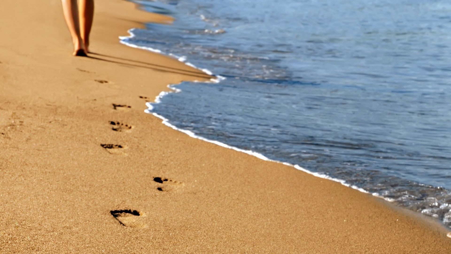 sea and ocean beach sand seashore water sea ocean travel shore vacation summer surf footprint wave seaside leisure fair weather nature