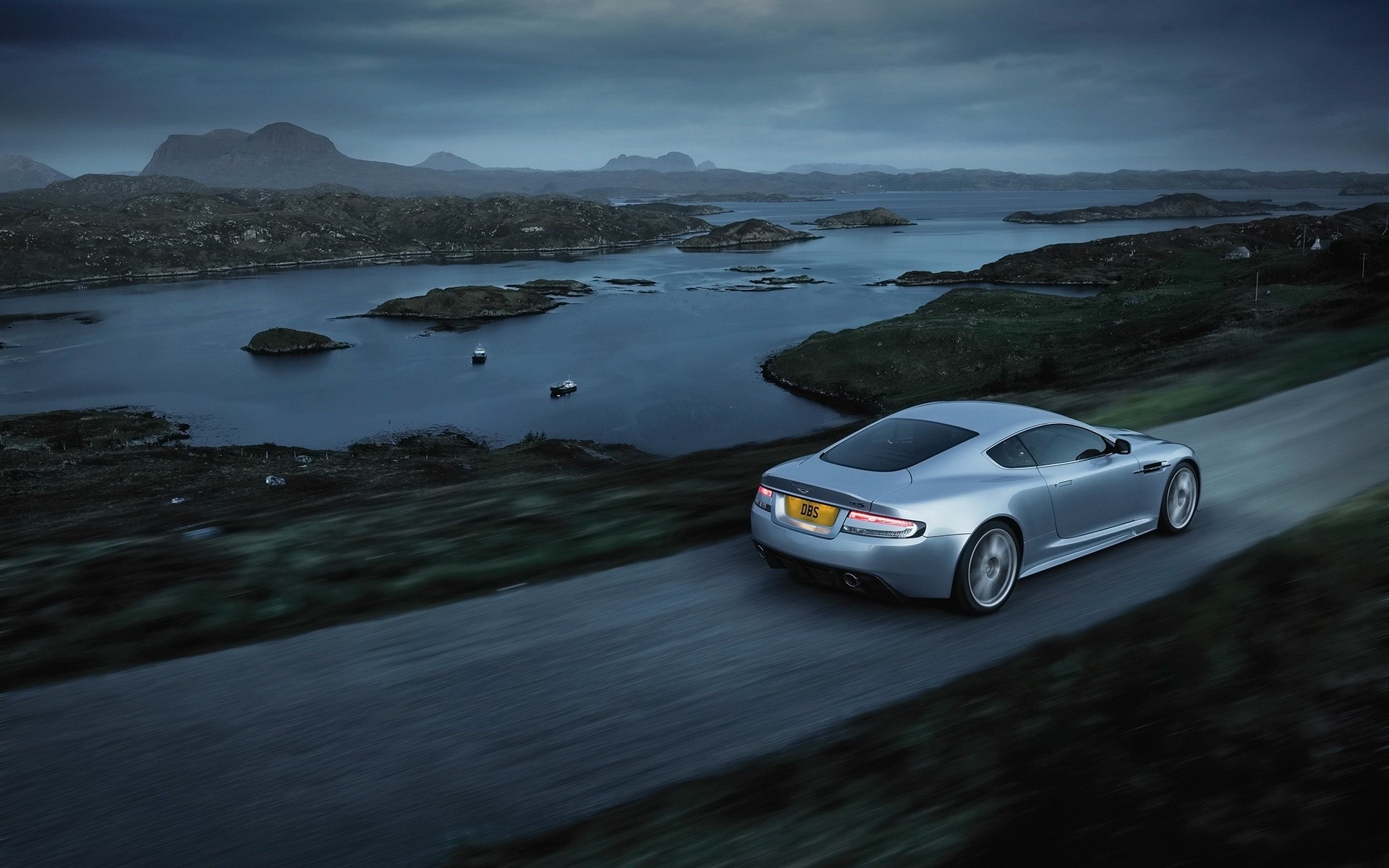 aston martin beach water ocean sea travel sunset landscape seashore car vehicle aston martin dbs