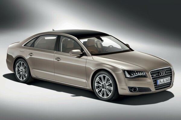 Beige audi on a gray background