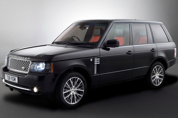 Range rover coche sobre fondo gris