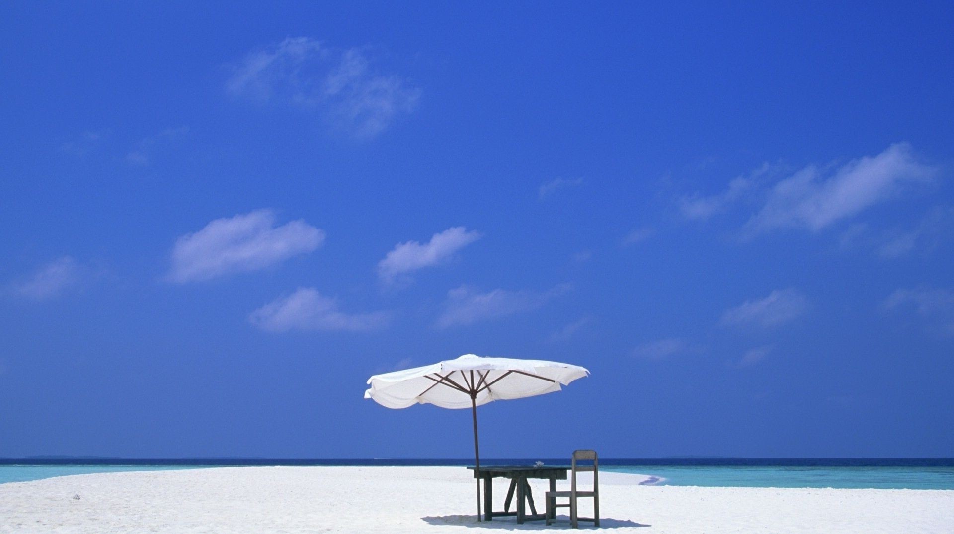 meer und ozean sand wasser sommer idylle strand himmel tropisch meer ozean reisen sonne meer entspannung landschaft gutes wetter fern insel