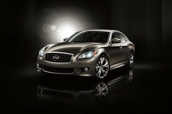 Silver infiniti car on a black background