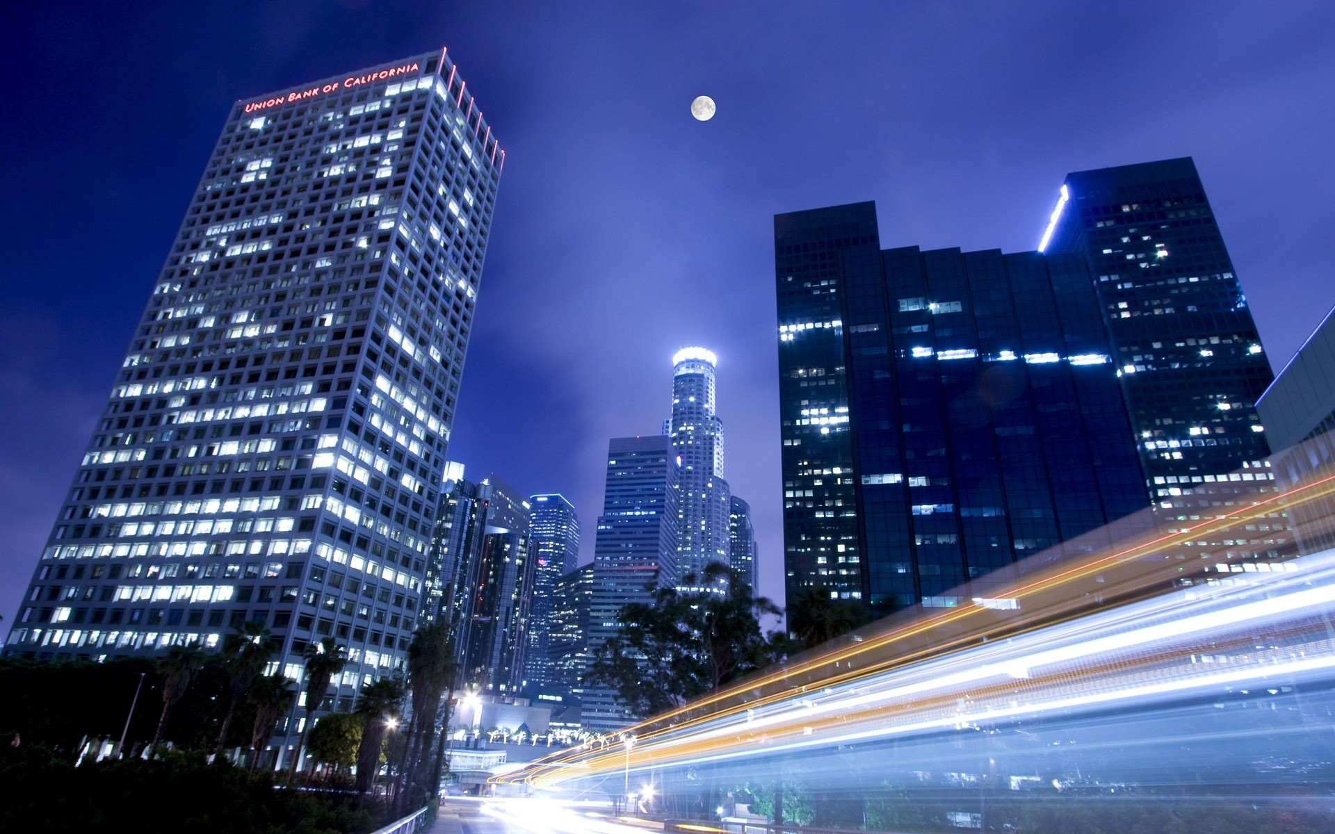 outras cidades centro da cidade arranha-céu cidade arquitetura crepúsculo cidade skyline tráfego casa urbano à noite o negócio iluminação viajar rápido céu moderno borrão estrada escritório noite