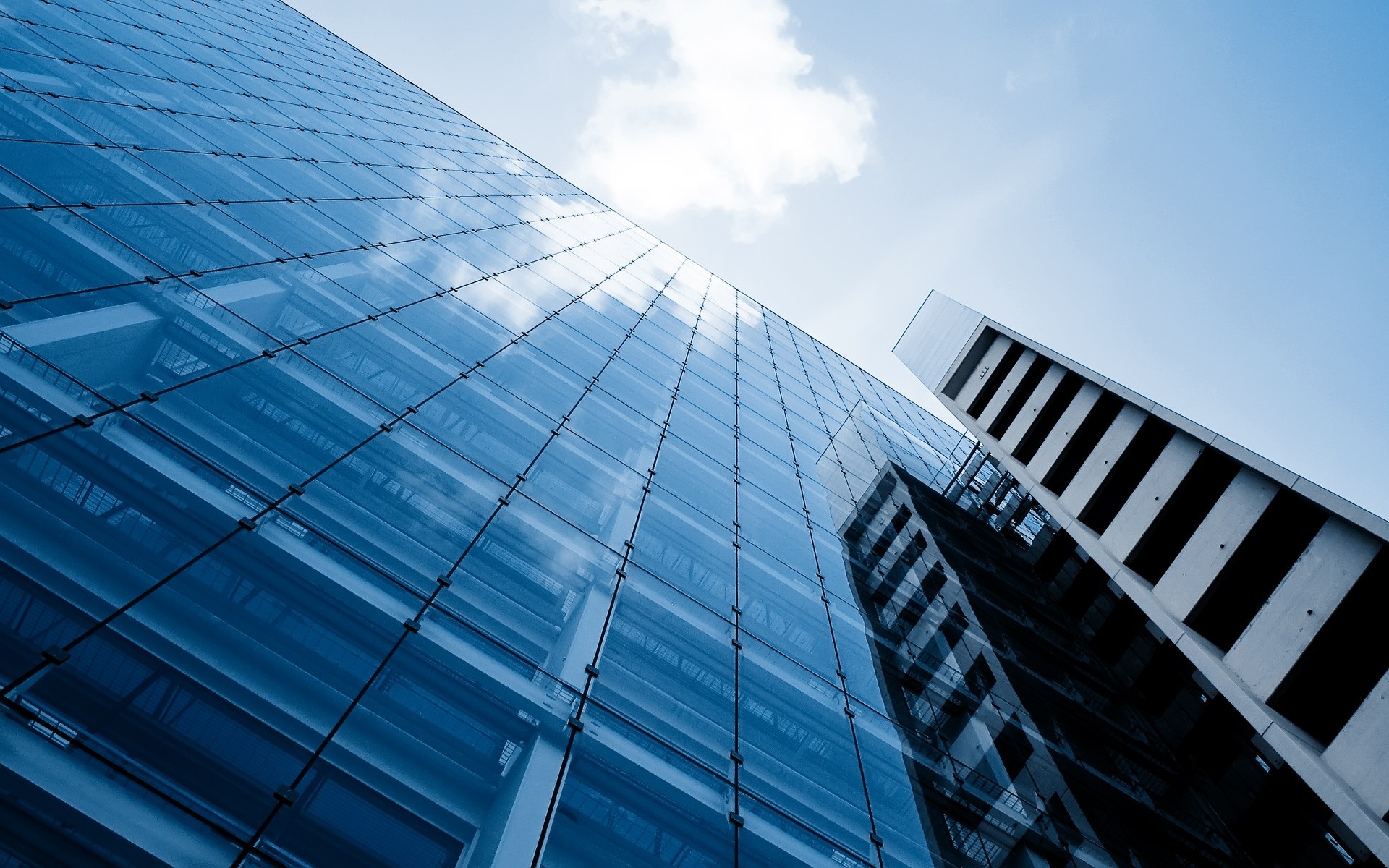 other city glass architecture futuristic business modern office perspective downtown window contemporary city steel reflection sky skyscraper building tall urban technology blue