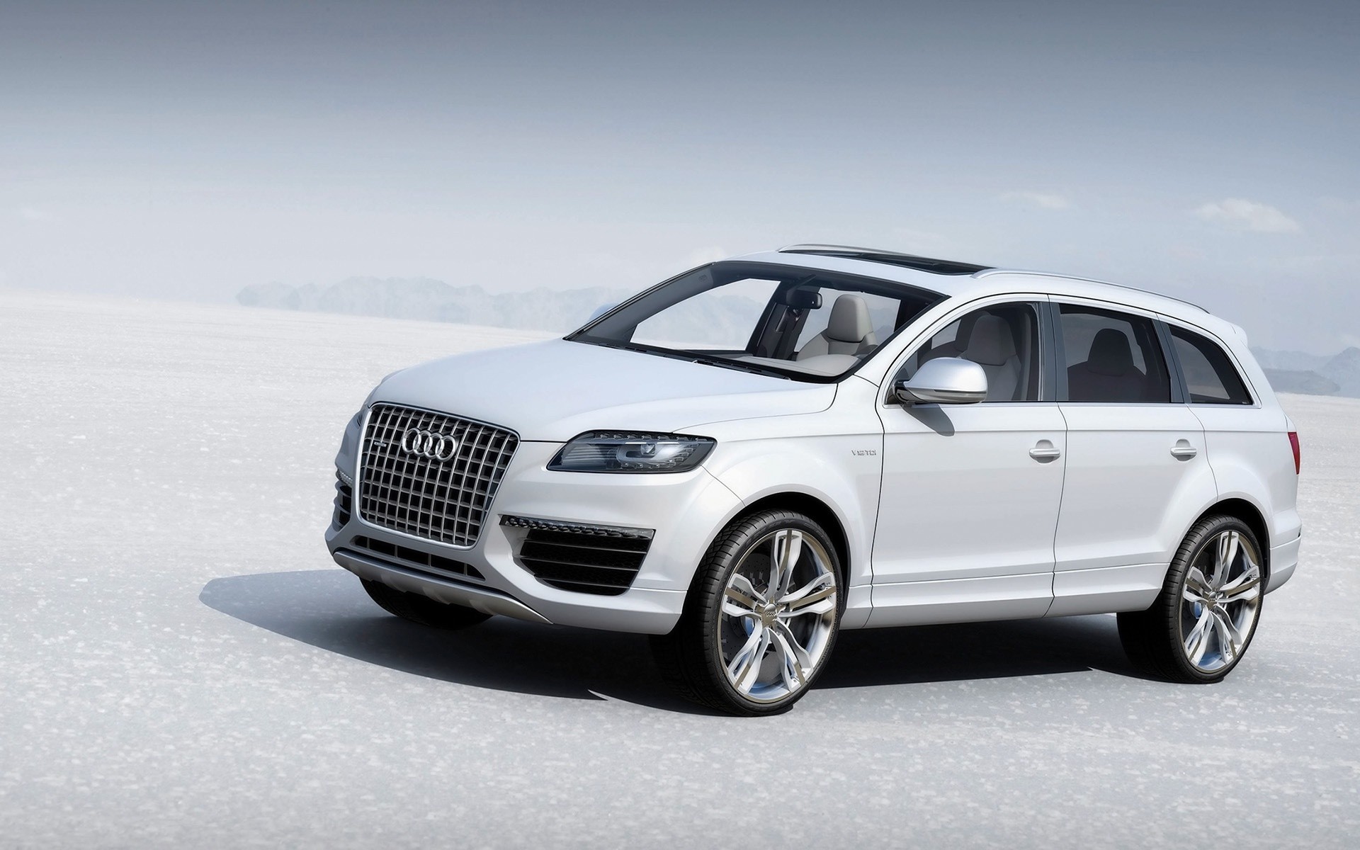 audi car vehicle automotive wheel transportation system blacktop noon asphalt fast coupe pavement hood drive sedan audi q7