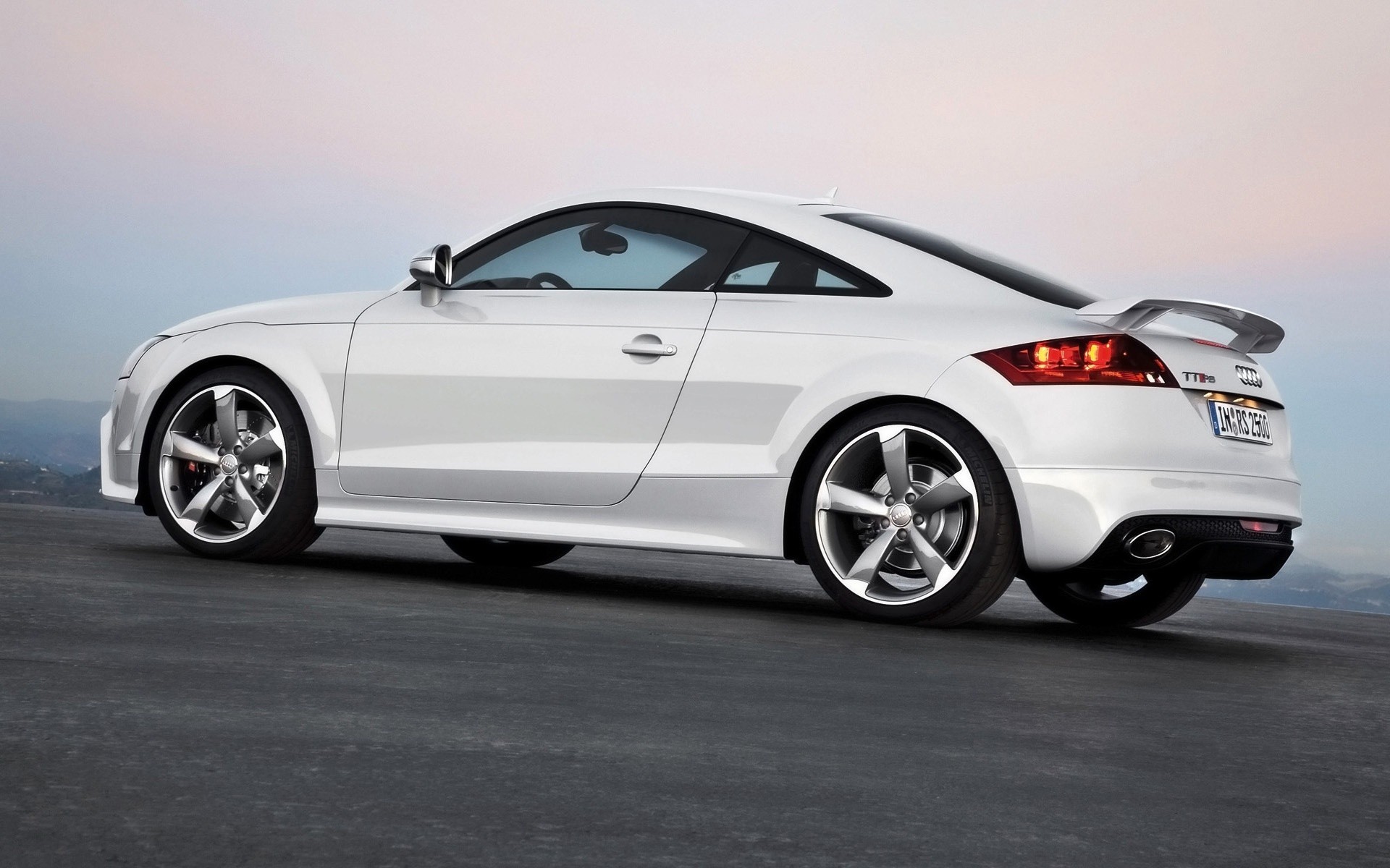 audi car vehicle automotive blacktop wheel coupe asphalt transportation system fast drive noon sedan hurry pavement action hood audi tt audi tt rs