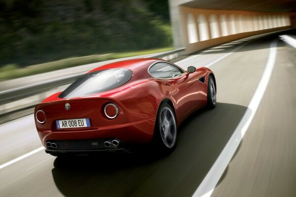 Alfa romeo car entering the tunnel