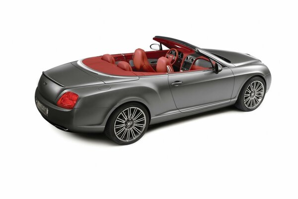 Bentley convertibile grigia con interni rossi