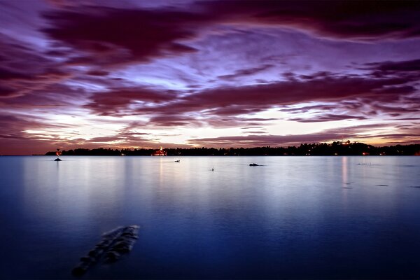 Dawn with reflection of light on the water surface