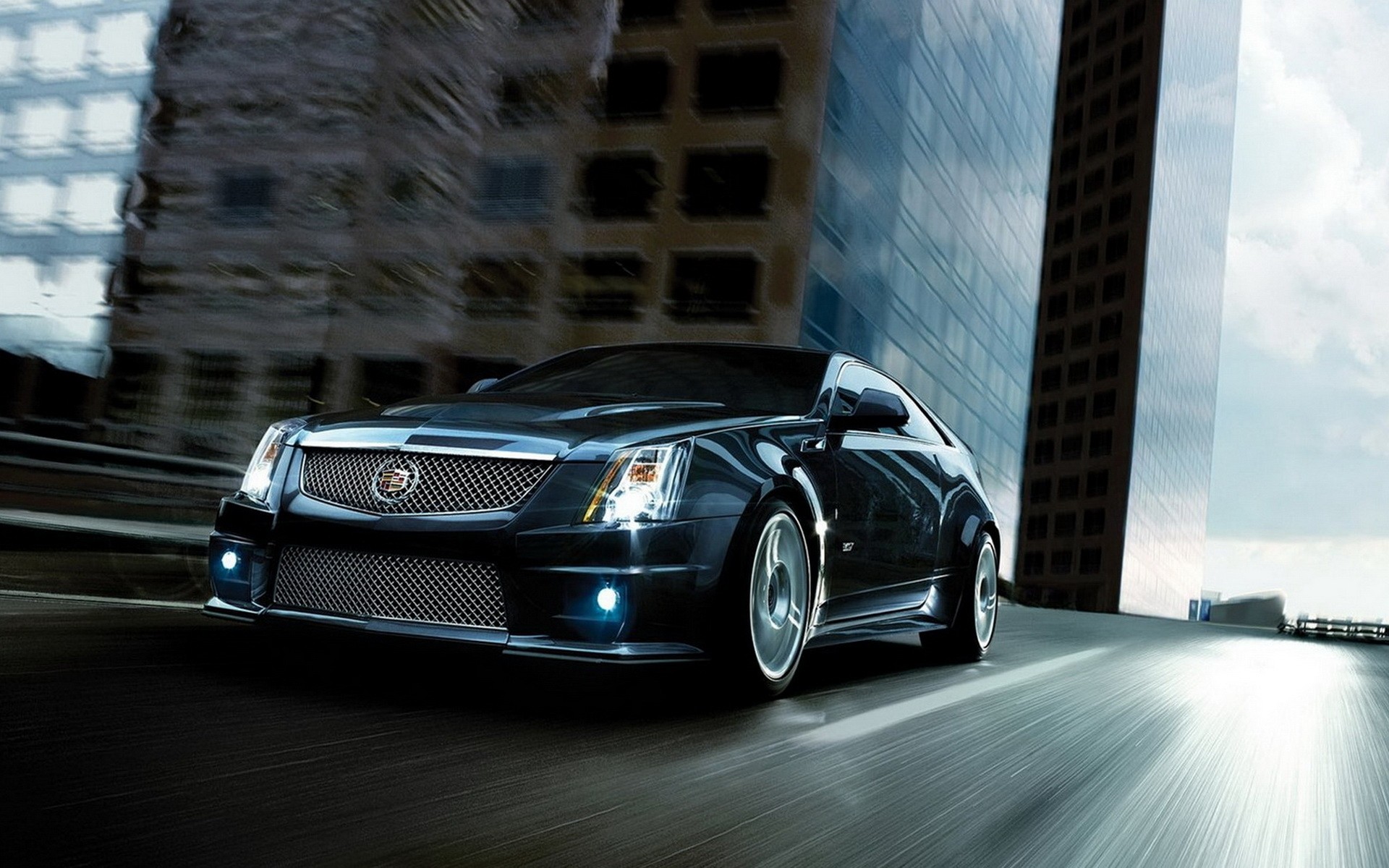 cadillac автомобиль автомобиль көлік жүйесі көше тротуар жол қала бұлыңғырлық саяхат жылдам автомобиль автомобильдер