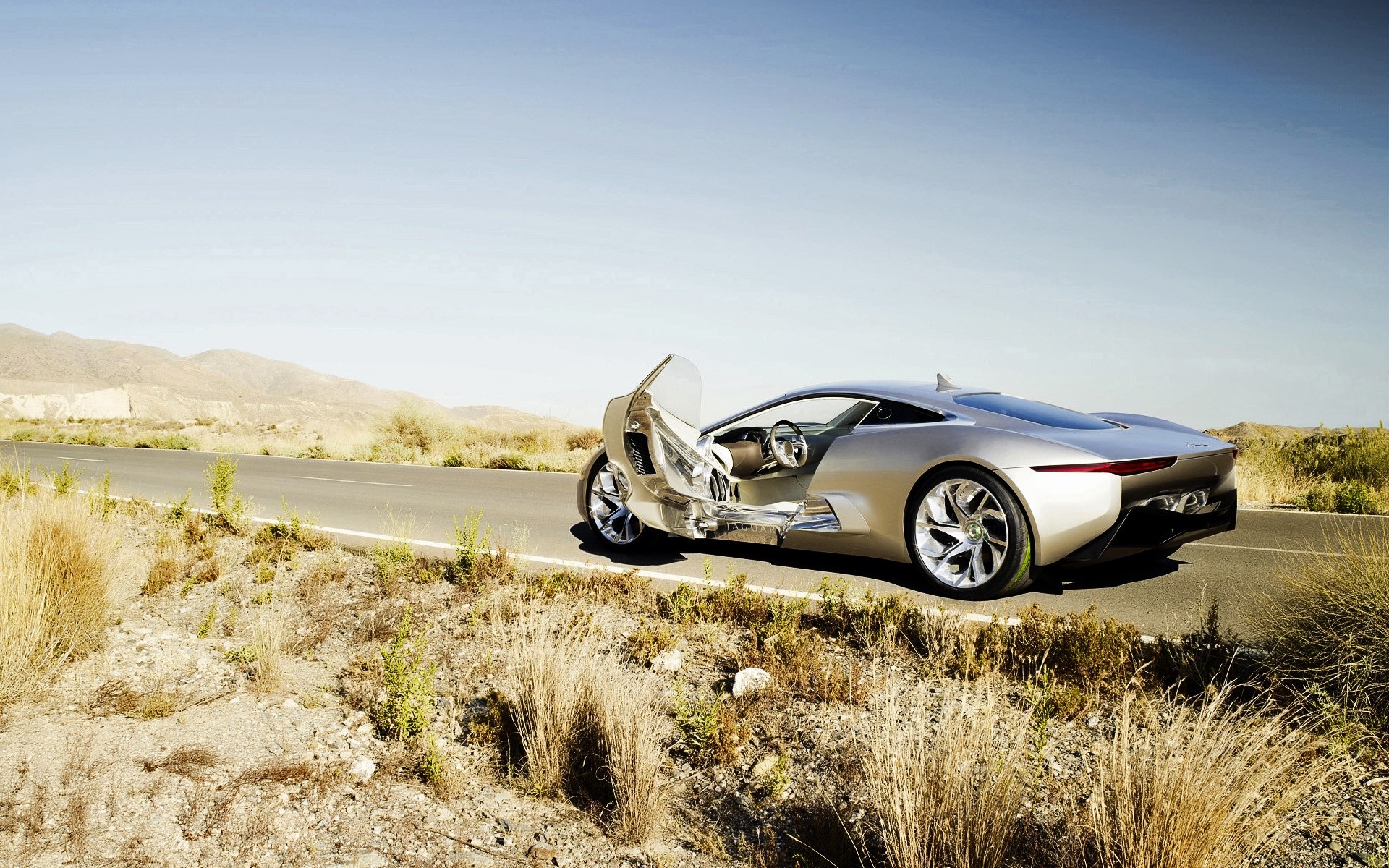 jaguar coche coche cielo paisaje al aire libre naturaleza viajes sistema de transporte verano carretera concepto jaguar