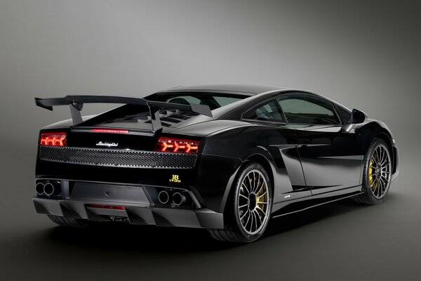 Black lamborghini rear view