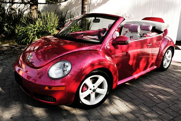 Red volkswagen car in the parking lot