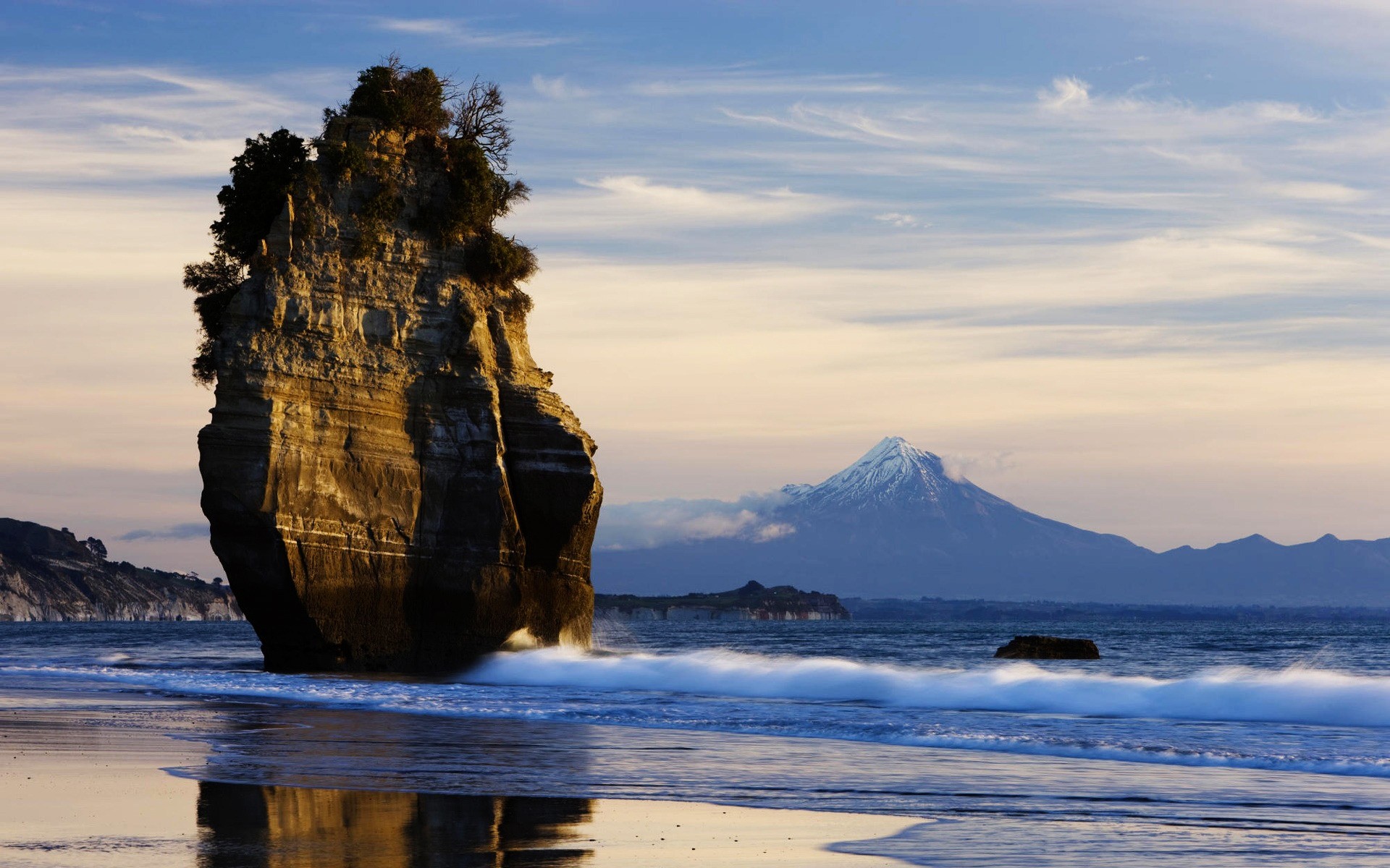 other city water travel landscape ocean beach sunset sea sky seashore outdoors nature rock reflection background