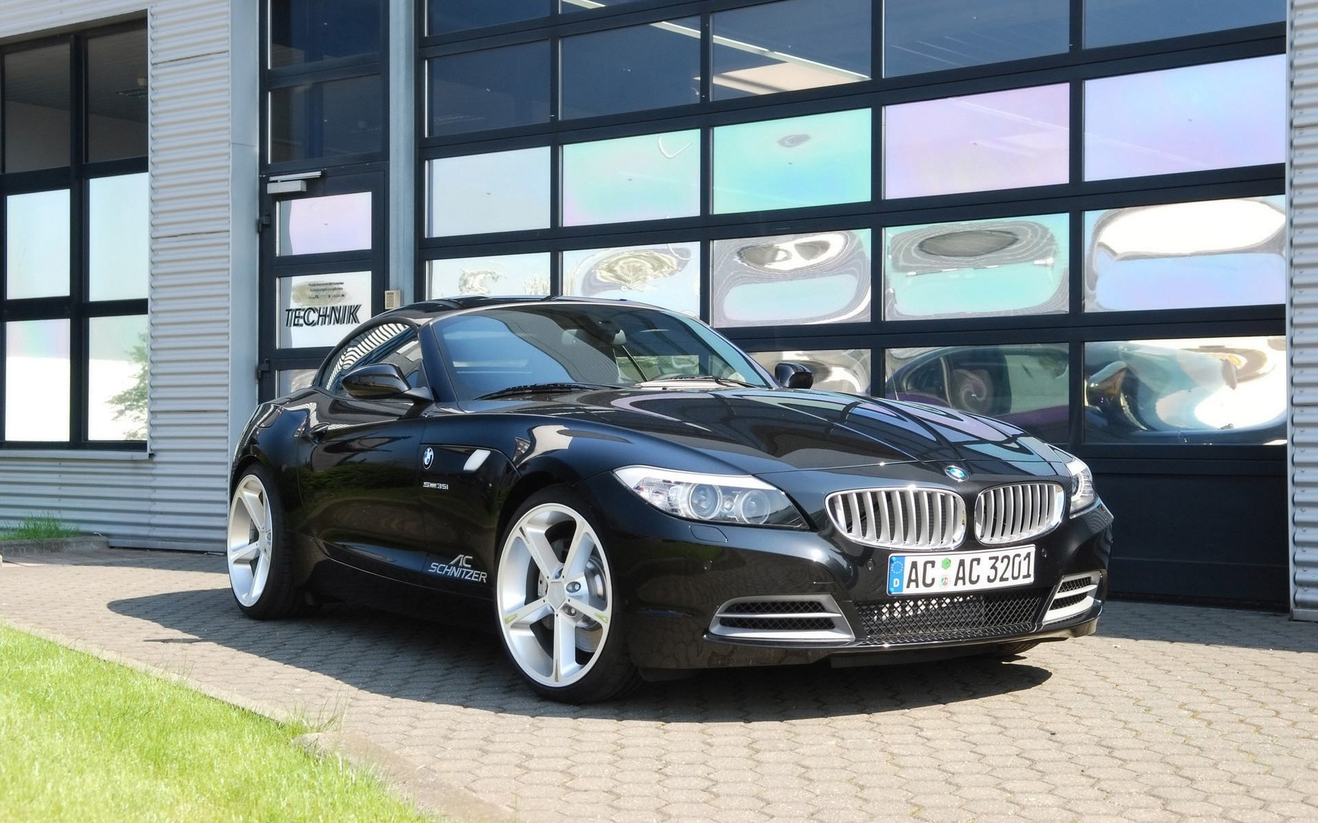 bmw auto auto bürgersteig transportsystem räder automobil asphalt ausstellung luxus mittags coupé schwarz auto bmw z4 zu vermieten