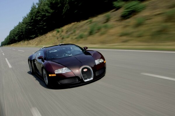 Asphalt is smoking under the wheels of an uncontrollably flying Bugatti