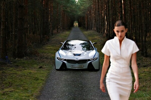 A woman in a white dress in the forest