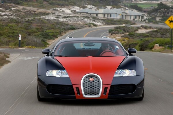 Bugatti leaves town in the evening