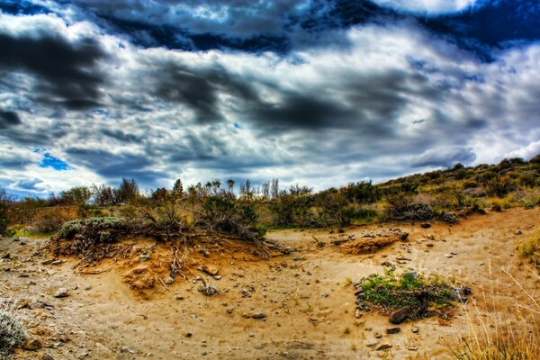 Desert landscape with thunderclouds