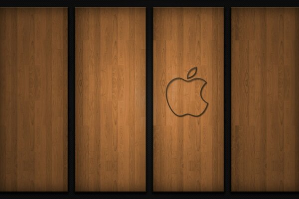 Signo de Apple sobre fondo de madera