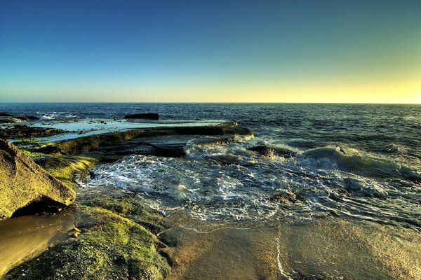 Waves breaking on a rocky shore