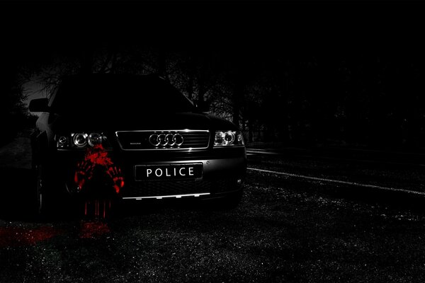 Carro da polícia Audi noite foto farol