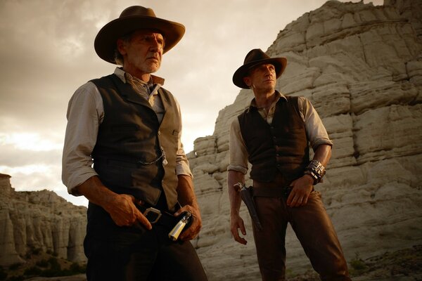 Two male cowboys among the rocky prairies