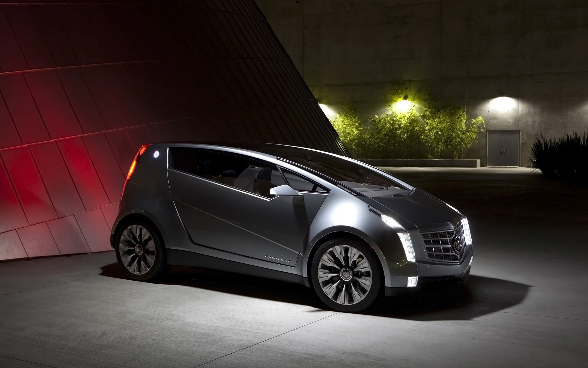 concept cars automóvil automóvil automóvil negro ruedas acera sistema de transporte asfalto coupé sedán mediodía campana cadillac de lujo urbano