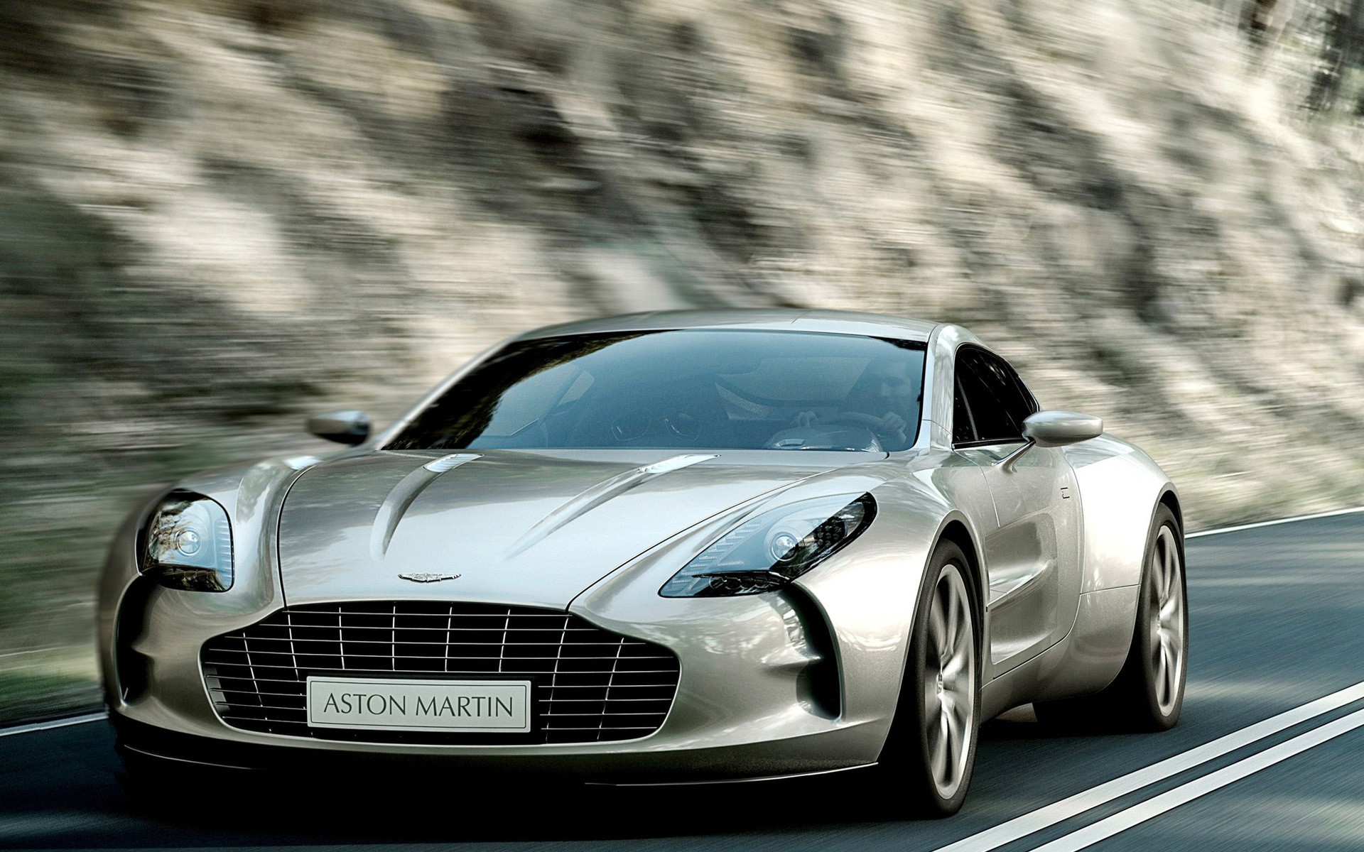 aston martin auto auto automobile veloce asfalto fretta disco nigella ruote pavimentazione sistema di trasporto coupé azione mezzogiorno aston martin coupe