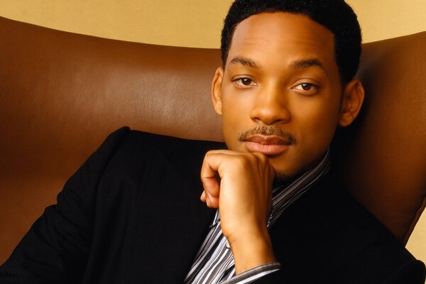 Foto di Will Smith in giacca con i baffi