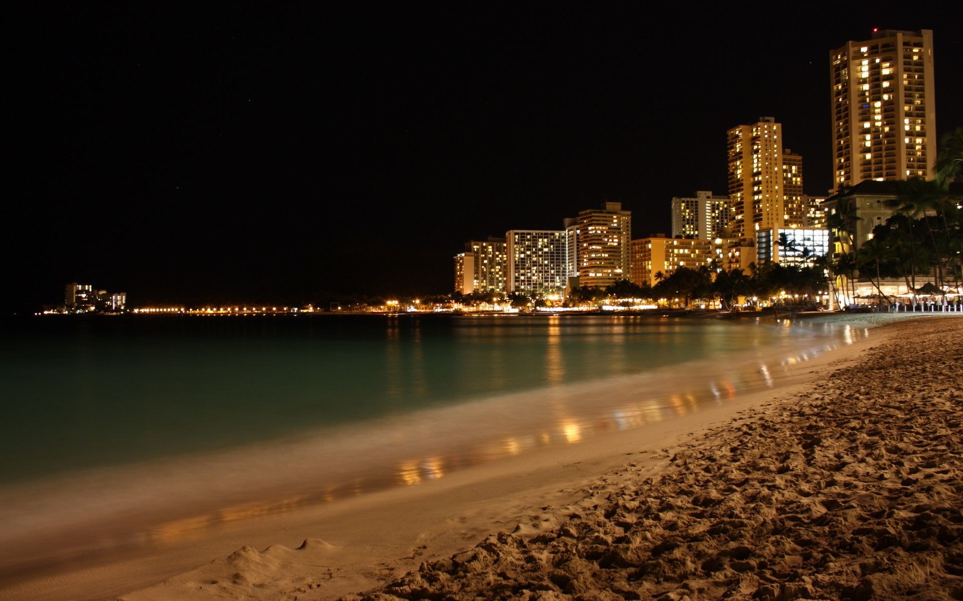 ciudad agua viajes arquitectura playa noche río ciudad puesta de sol cielo skyline mar casa rascacielos centro de la ciudad paseo marítimo luz urbano crepúsculo