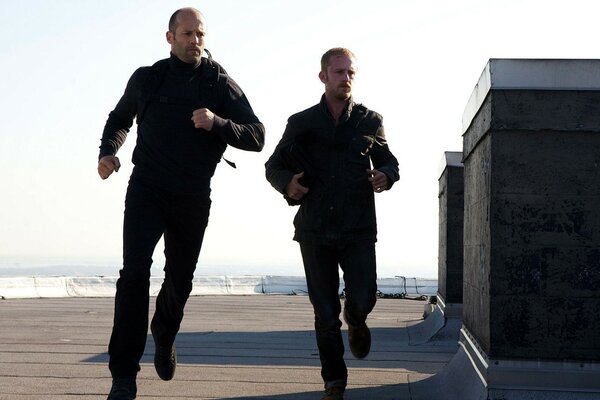 Running men in black to work