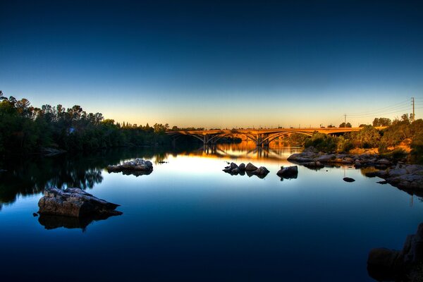 Silent mirror lake at dawn