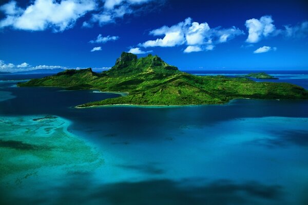 A green island in the middle of mighty boundless water