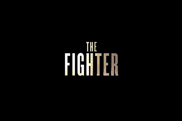 Die Inschrift the fighter auf schwarzem Hintergrund