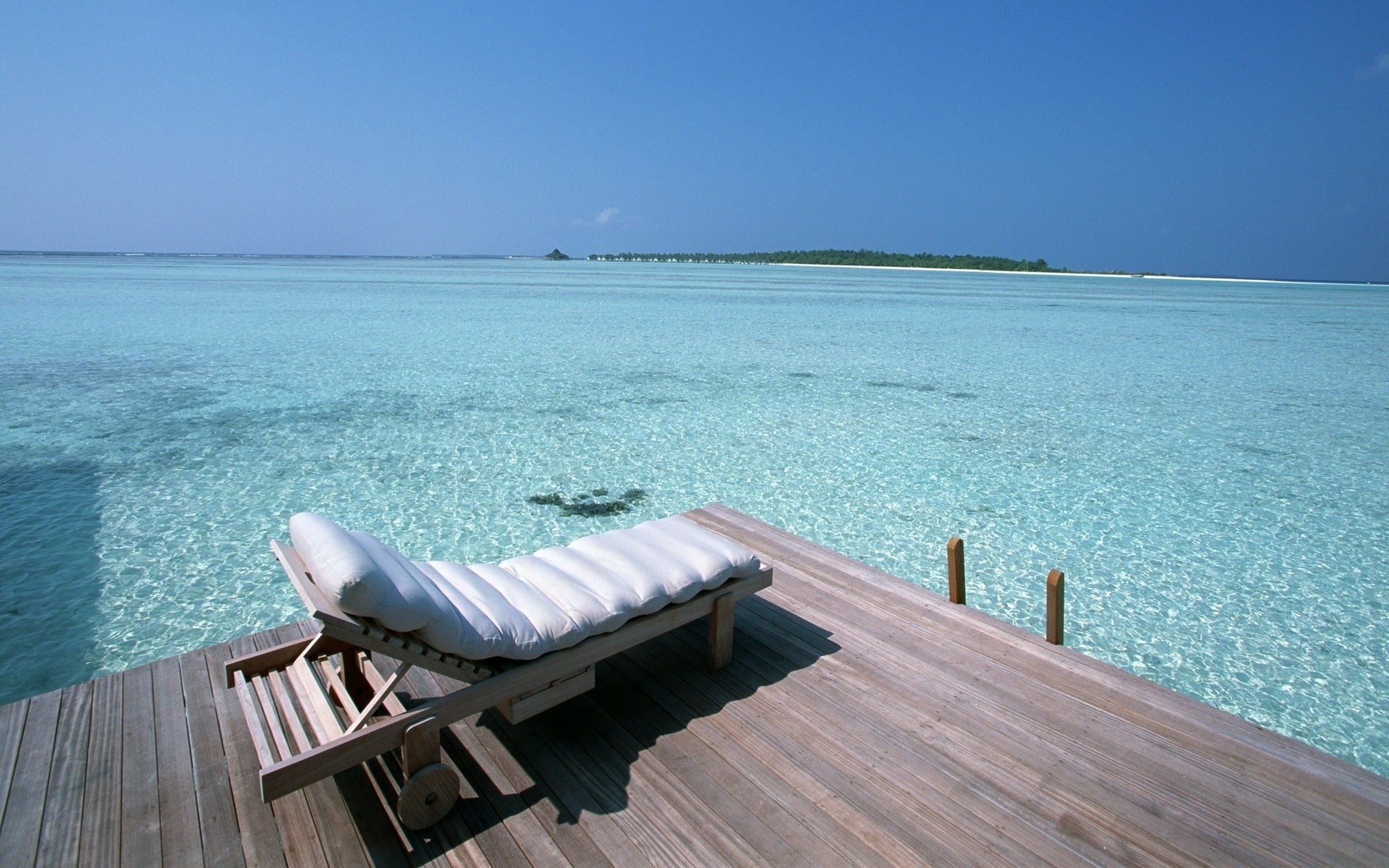 verão água relaxamento praia viagens mar oceano tropical férias mar cadeira sol resort areia férias bom tempo idílio céu ilha