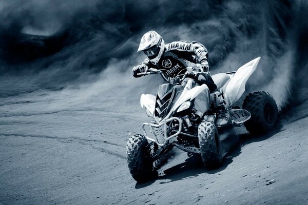 Dusty ATV conquers arid desert