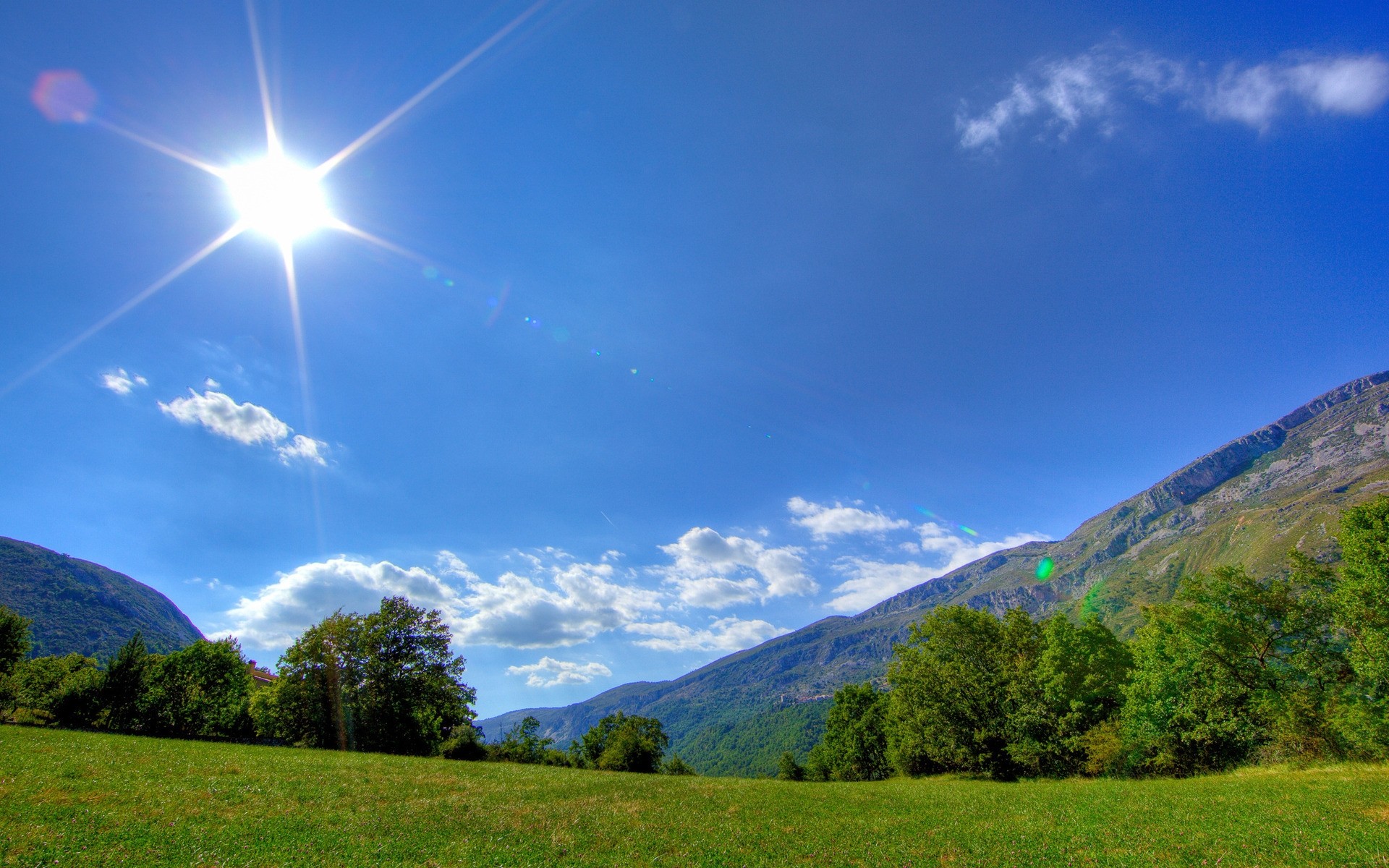 landscapes nature landscape sky grass mountain travel outdoors fair weather sun tree summer wood rural hill countryside