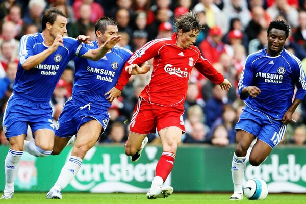 Football match of blue and red players