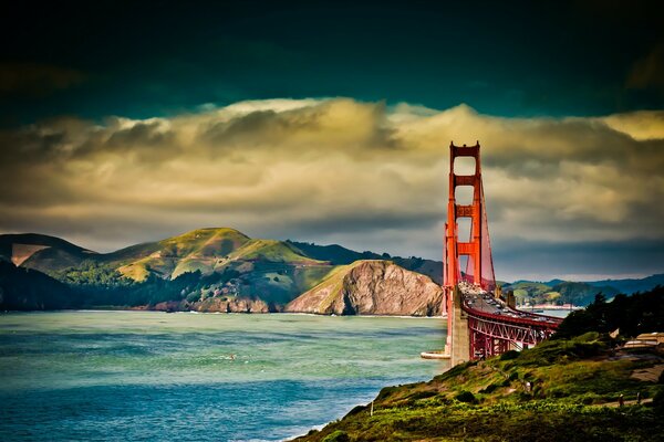 Red bridge across the pond