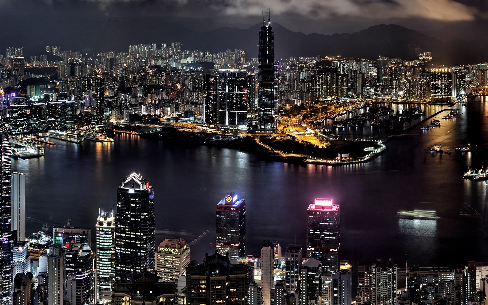 other city city cityscape harbor travel skyline dusk water skyscraper river urban waterfront building evening architecture downtown bridge pier reflection business night