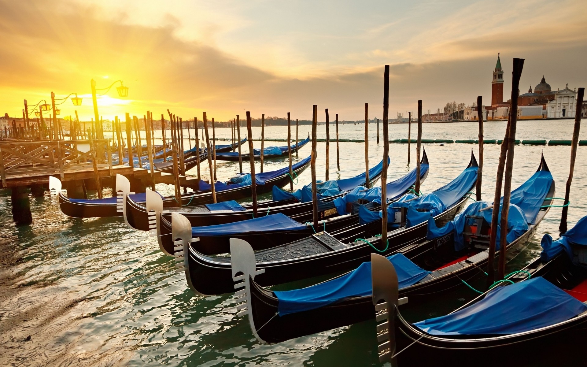 italy water gondola boat lagoon venetian travel sea sun romantic leisure vacation sunset summer ocean tourism dawn watercraft recreation gondolier boats picture pics photo