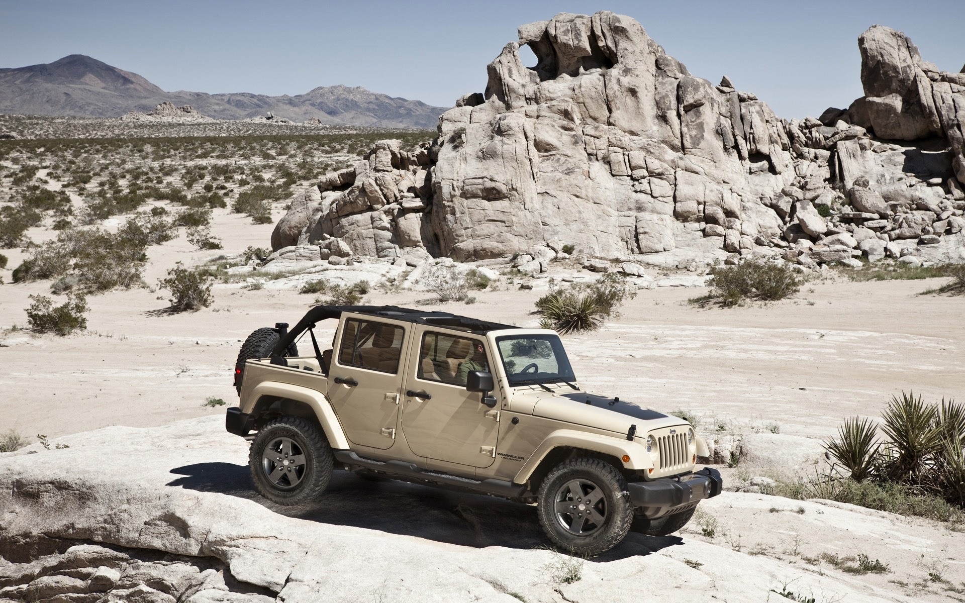 jeep travel desert landscape sky outdoors rock mountain vehicle nature scenic tourism transportation system adventure sand jeep wrangler